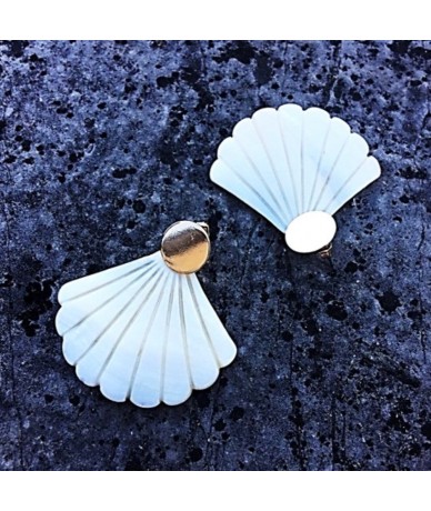 Mother-on-pearl earrings handmade in London in limited edition by Anne L'Or London