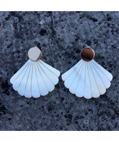 Mother-on-pearl earrings handmade in London in limited edition by Anne L'Or London